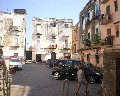 12035 Traversa dietro al Teatro in quest' area c' era il Teatro Garibaldi ora Mercato di indumenti e materiale reciclato.jpg (73365 bytes)