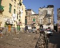 12047 Traversa dietro al Teatro in quest' area c' era il Teatro Garibaldi ora Mercato di indumenti e materiale reciclato.jpg (93202 bytes)